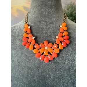 vintage orange floral statement necklace lucite cabochons on a gold-tone chain
